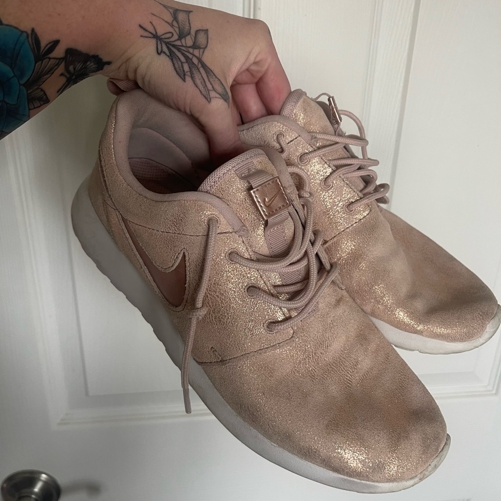 Rose gold Nike shoes size 8.5